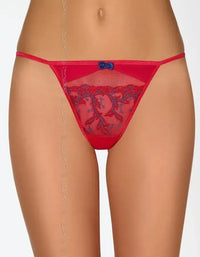 Axami Cerise G-String with vivid red and blue lace pattern, delicate blue bow, and minimal coverage.