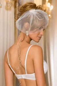 Elegant bridal model in a white Axami Dama de Honor push-up bra with delicate lace and wide straps.