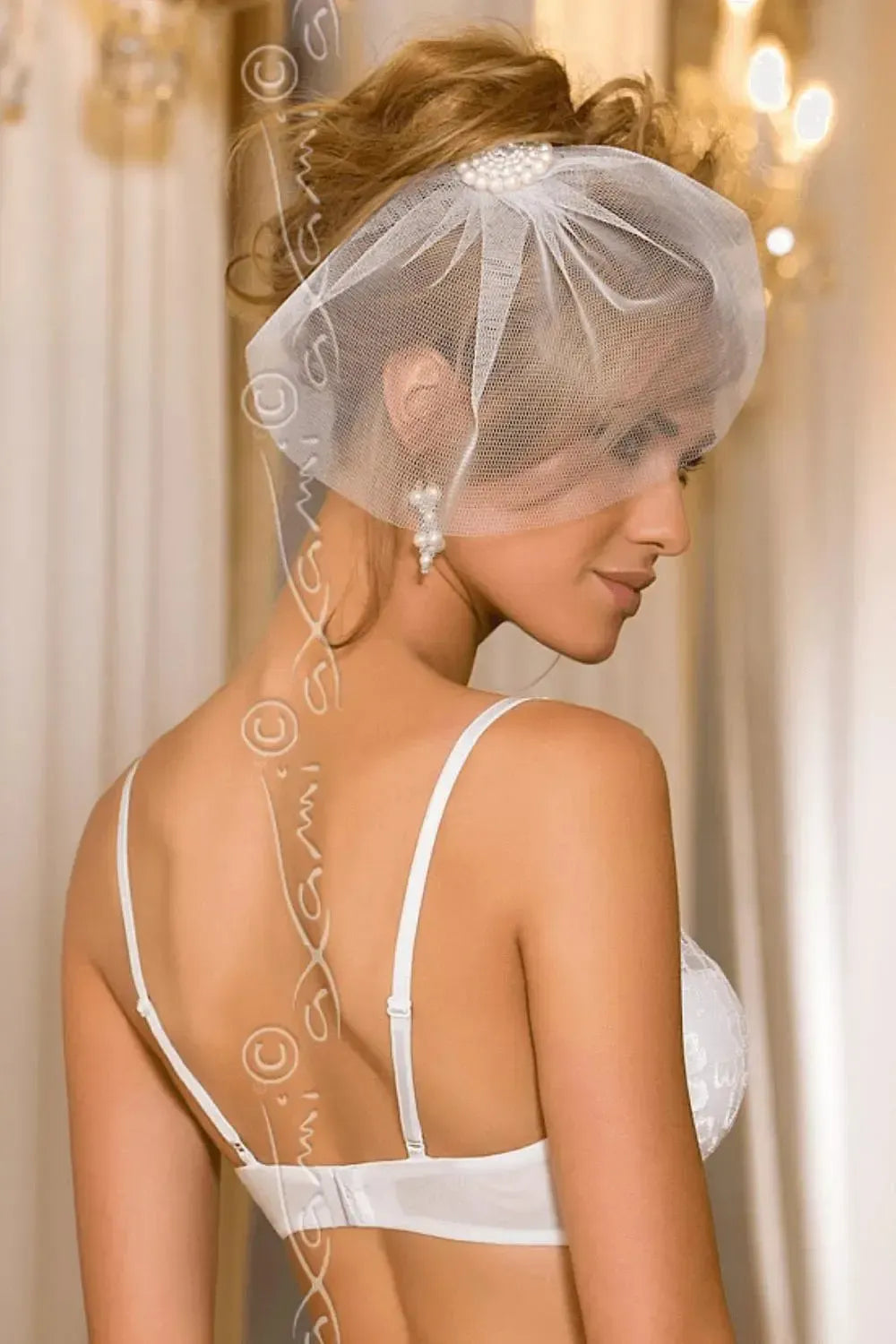Elegant bridal model in a white Axami Dama de Honor push-up bra with delicate lace and wide straps.