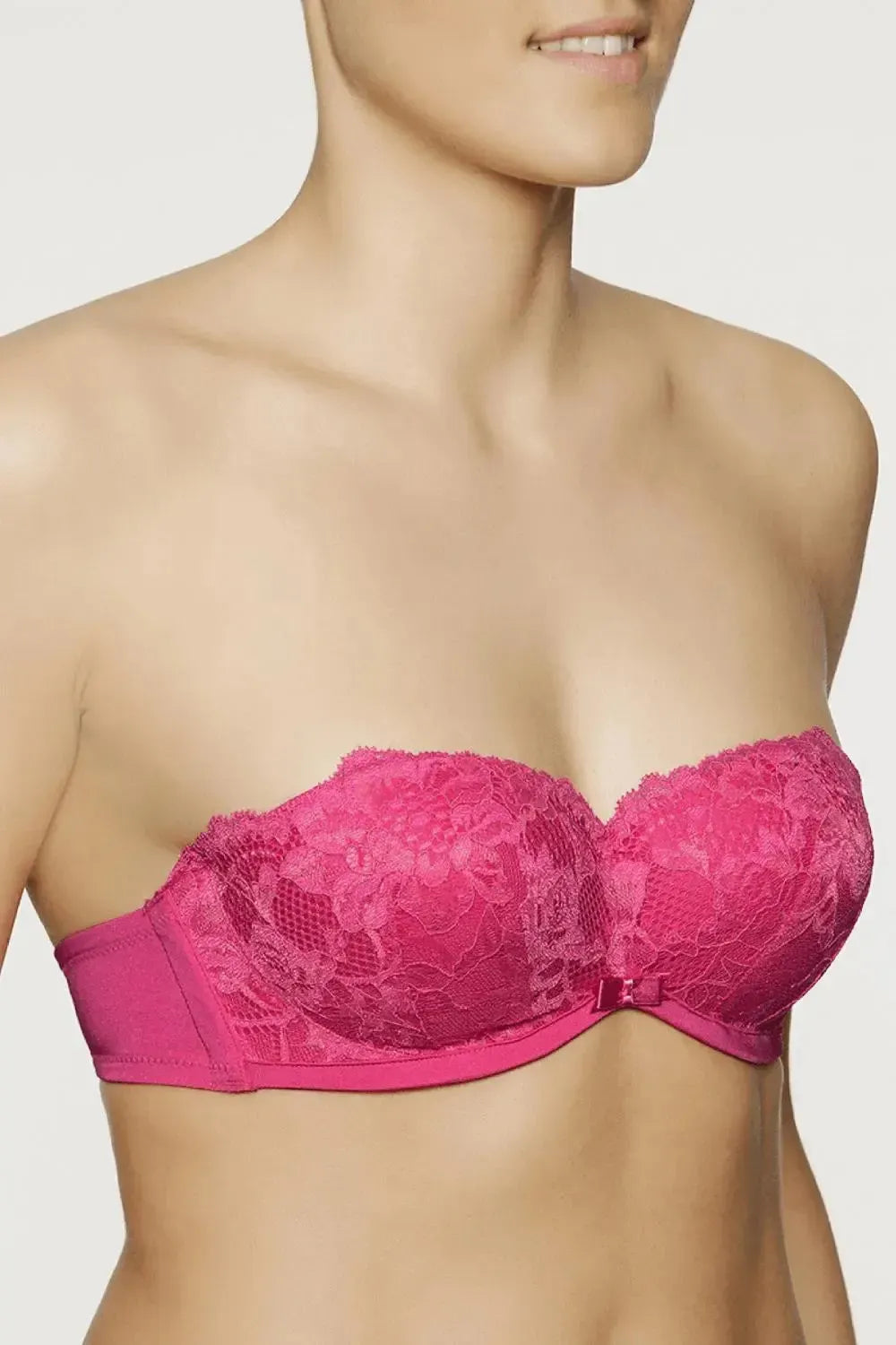 Irresistible fuchsia pink strapless multiway bra with two-tone lace, shine fabric, and gold accessories.