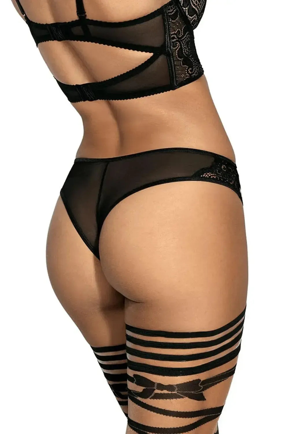 Black Axami Isabella sheer lotus tanga thong with delicate motif and lace detail, paired with matching lingerie.