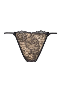 Tempting Axami Tiramisu V-String Thong with elegant black lace on a beige background and sensual cut.