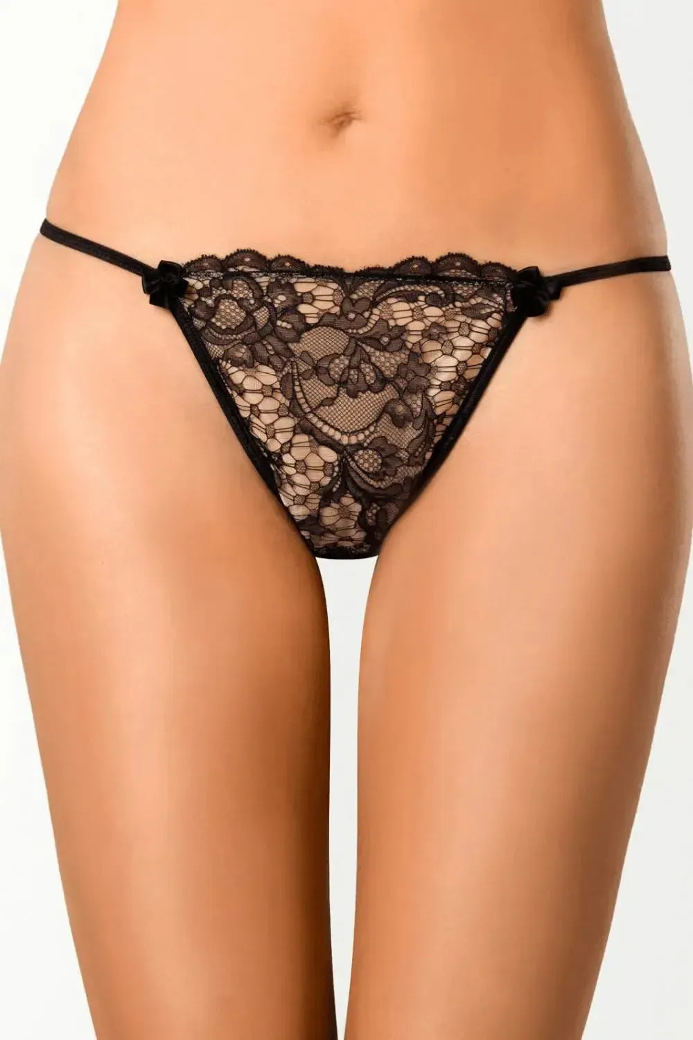 Tempting Axami Tiramisu V-String Thong with elegant black lace on a beige background, featuring sensual cut and keyhole back.