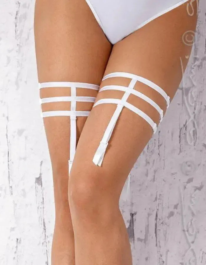 Seductive white Virason garters with delicate multi-strap design, enhancing any lingerie set.